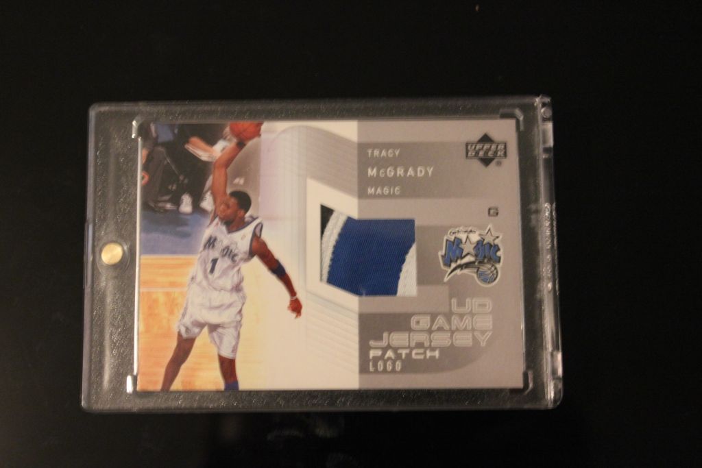 McGrady 03-04 UD Game Jersey Patch Logo.jpg