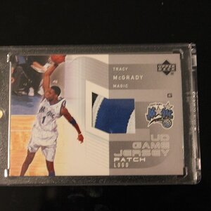 McGrady 03-04 UD Game Jersey Patch Logo.jpg