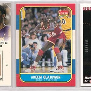 2001-02_ud_gu_floor_kobe_bird_gold_1986-87_fleer_hakeem_2002-03_ud_authentics_jordan_mj2.jpg