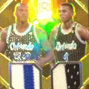 Spectra Double team Jerseys Gold #5 of 10.JPG