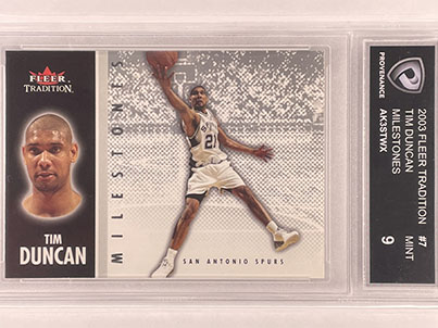 Insert - Milestones - Fleer - 2003-04 - Tim Duncan.jpg