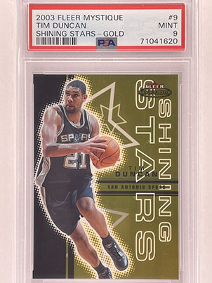 Insert - Shining Stars - Fleer Mystique - 2003-04 - Gold - Tim Duncan.jpg