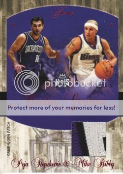 Vince Carter player worn jersey patch basketball card (Toronto Raptors)  2002 Fleer Premium Gear #VC